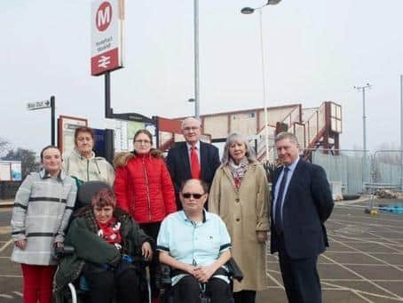 At the front: Damon Nicholson and his cousin Stephanie Downes are unable to use one of Pontefract Monkhill's platforms because there is no step-free access. At the back from left to right are Damon's sister Mary Nicholson, Stephanie's sister-in-law Susan Smith, Damon's father's partner Karina Nicholson and Pontefract councillors Clive Tennant, Pat Garbutt and David Jones.