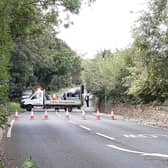 Police are on the scene of the incident on the A642, close to the National Coal Mining Museum, where a power cable has fallen to the ground.