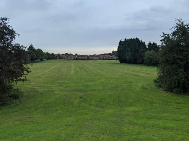 The park is currently a large grassed area without any other features.