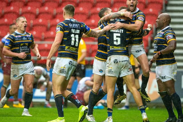 Leeds Rhinos celebrating during the Challenge Cup semi-final win over Wigan Warriors. Now they know when they will play before and after Wembley. (PIC: BRUCE ROLLINSON)