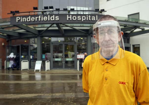 Pinderfields Hospital greeter Richard Holmes has been awarded a BEM. Picture Scott Merrylees