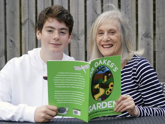 Harry and Anita Fatchett with the book