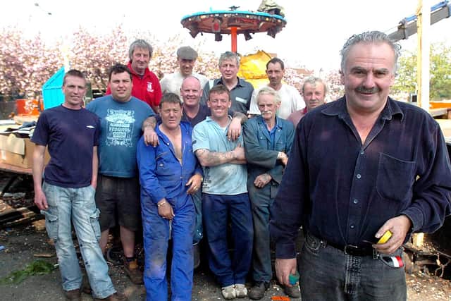 Barry Spurr, better known as 'Sproggy', spent more than 55 years working on the city's Noah's Ark fairground ride behind the former market. Pictured are Sproggy, Austin and staff at the former site in 2008.