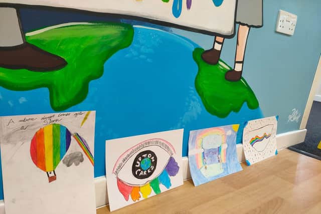 Based on the winning designs, Rachel then painted a mural in the school’s reception area