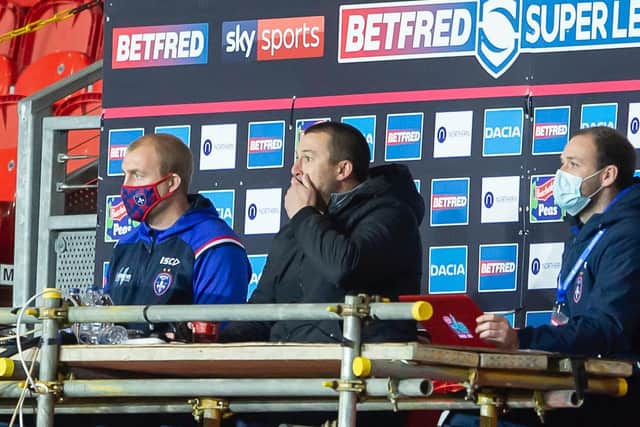 Under-pressure Wakefield Trinity coach Chris Chester (middle) during the game against Huddersfield Giants.  (Isabel Pearce/SWpix.com)