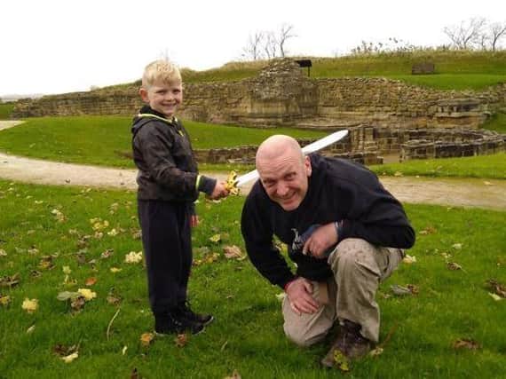 Don't lose your head....Jimmy and Henry Vaughan recreate the execution at the castle.