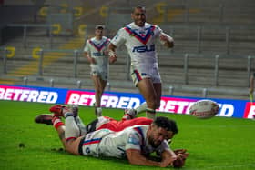 Brace: Wakefield forward Kelepi Taginoa touches down for Trinity's second try - the first of his pair. Picture Bruce Rollinson