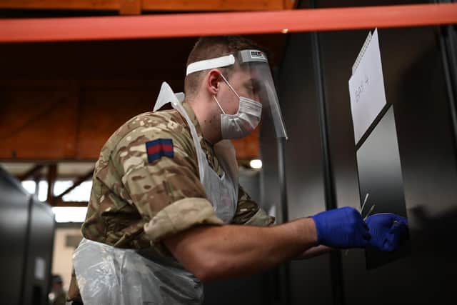 British Army soldiers process coronavirus tests in Liverpool as part of the mass testing pilot operation. Photo: OLI SCARFF/AFP via Getty Images
