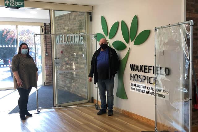 A family-run Wakefield business has donated a number of protective screens to Wakefield Hospice. Pictured is Alan Mohan delivering the screens to Keeley Harrison.