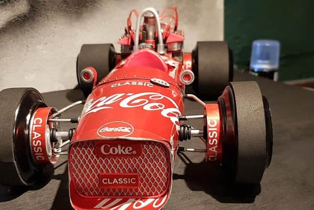 Lindsay Kirk, 57, has tinkered and tailored hundreds of cans of the popular soft drink into the incredibly detailed designs - including recreations of F1 cars.