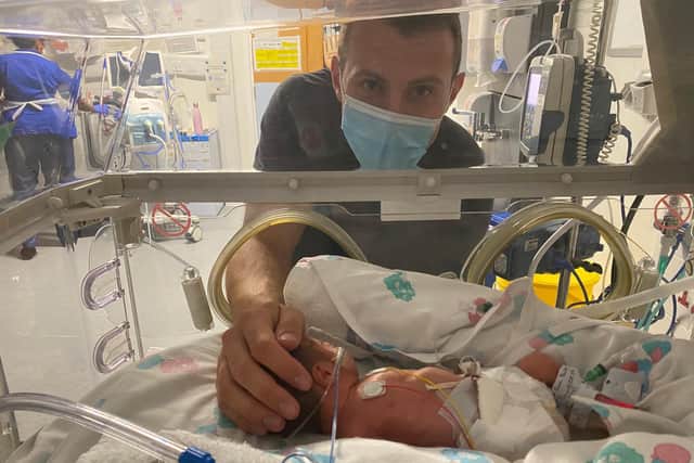 A Pontefract couple have praised the 'unbelievable skill and knowledge' of NHS staff who cared for their premature baby. Pictured is dad Chris Burns with baby Archie during his stay on the Neonatal Intensive Care Unit.