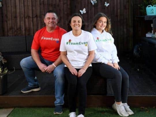 The family of Evan Hawksworth who died in a rugby match when he was 14, are fundraising for the Mission Christmas Appeal. Pictured at their home at Robin Hood, Wakefield, are Evan's mum Michelle Hawksworth with husband Gary and and daughter Eleni. Picture by Simon Hulme