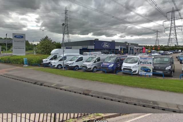 A crook who robbed a car salesman of an Audi worth £8,000 on the forecourt of a West Yorkshire car dealership has been sent to prison.