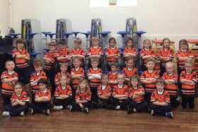 Pupils from Aberford Primary School in their Castleford Tigers shirts.