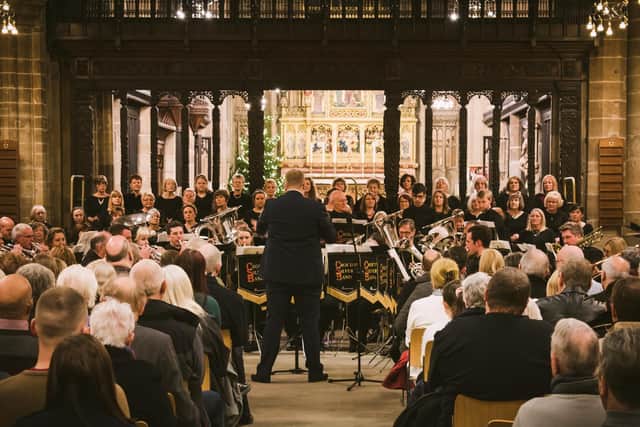 Crofton Silver Band, which was formed in 1873, is facing financial hardship after a year without concerts or functions. Pictured is the band performing at Wakefield Cathedral before the pandemic.