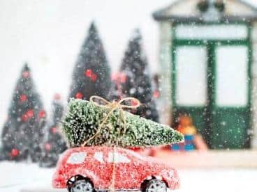 Is it illegal to put a Christmas tree on the roof of my car to carry it home?