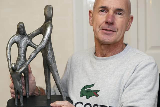 PICTURED: David's son, Nigel Carter, with one of his father's sculptures