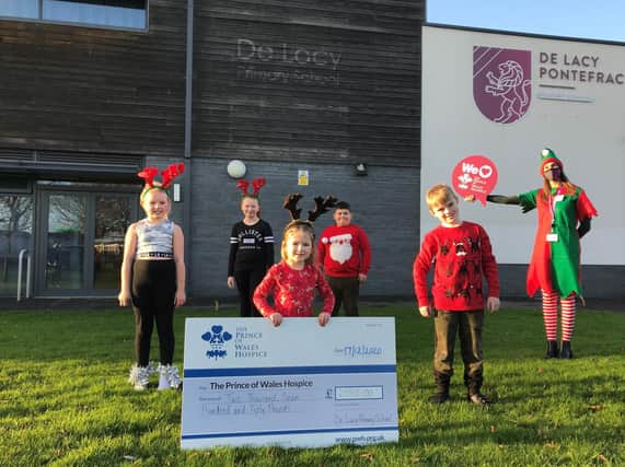 Pupils at De Lacy Primary school who took part in a reindeer run for charity