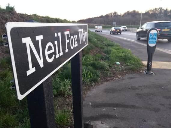 Emergency services were called to Neil Fox Way.