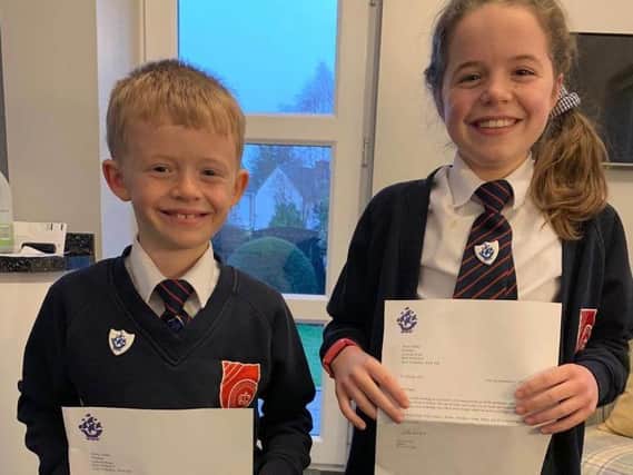 Two delighted siblings Daisy and Henry from Halfpenny Lane Junior, Infant and Nursery School