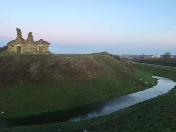 This impressive photo shows the moment Wakefield's historic Sandal Castle moat was filled with water after a week of heavy snow and rain. Photo: Friends of Sandal Castle.