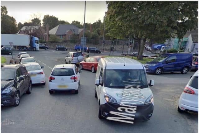 Google Streetview's snapshot of the area shows a chaotic rush hour scene.