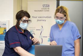 The number of cases of Covid-19 in the Wakefield district has topped 20,000 for the first time. Pictured are staff at a vaccination centre at Spectrum Community Healthcare, Wakefield.