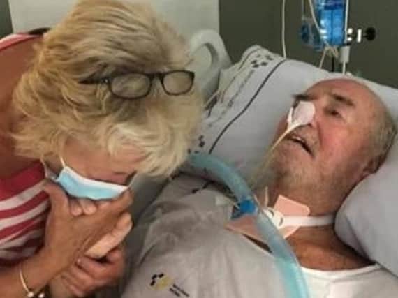 Bill Annable pictured in hospital in Tenerife with wife Dot.