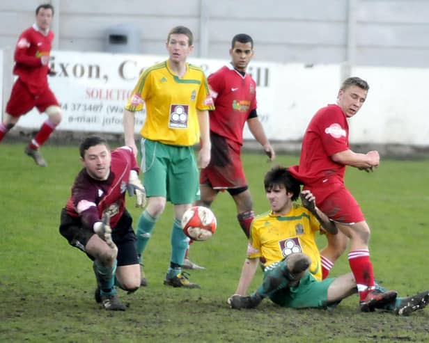 Action from Ossett Town's clash with Marine.