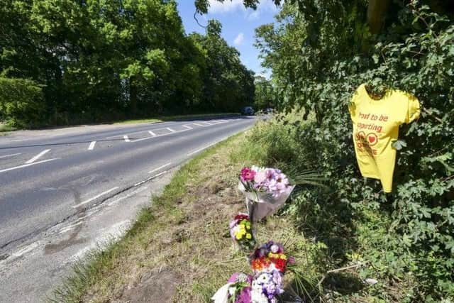 Flowers left at the scene where couple died in a head-on smash.