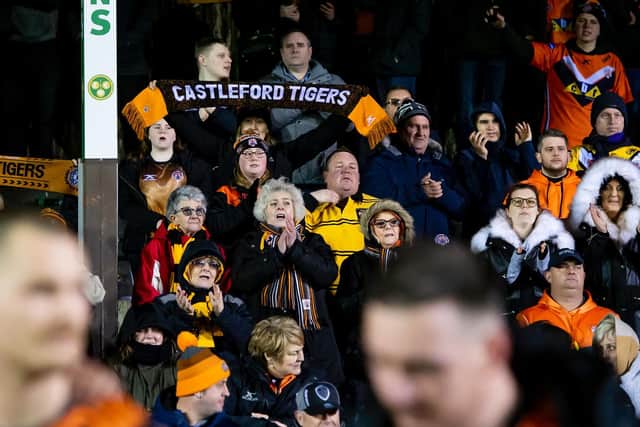 Picture by Allan McKenzie/SWpix.com - 21/02/2020 - Rugby League - Betfred Super League - Castleford Tigers v Wakefield Trinity - the Mend A Hose Jungle, Castleford, England - Castleford's fans celebrate thier side's victory over Wakefield.