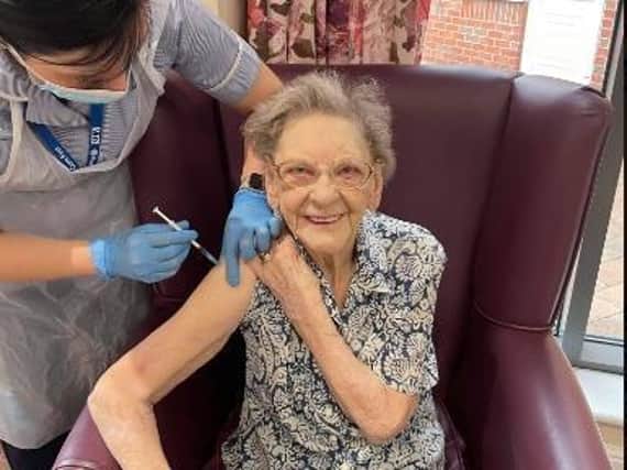 Barbara Mills, 89, had a smile reaching from ear to ear as she received her second jab.