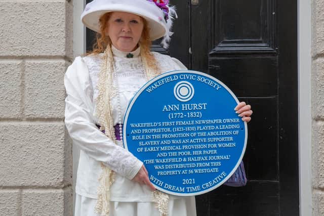 A blue plaque honouring a “visionary” newspaper editor who campaigned for the abolition of slavery has been unveiled in Wakefield to mark International Women’s Day. Pictured is Sarah Cobham with Ann Hurst's plaque. Photo: Jessica Robottom