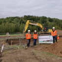 Turning tide....Methley councillors at the site of the scheme as work got underway.