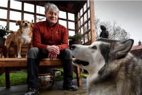 Vic Ferguson pictured with his dogs Mishka and Amber. Picture by Simon Hulme