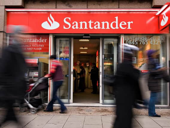 Banking giant Santander has revealed plans to close more than 100 branches in the next year - including those in Castleford and Dewsbury. Photo by LEON NEAL/AFP via Getty Images