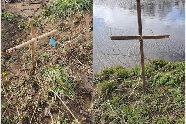 Mystery surrounds the appearance of more than a dozen crosses by the side of a Wakefield river. Photos: Rachael Sharp