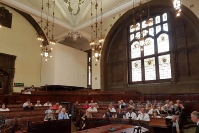 The council chamber at County Hall has to accommodate 63 elected members for full council meetings. The Conservatives and Lib Dems said they believed councillors could be safely accommodated here and contrasted it with the House of Commons debating chamber.