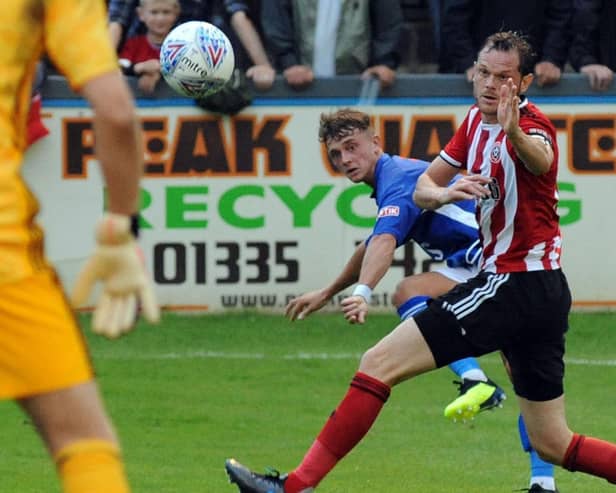 Ben Morris, pictured in action for Matlock Town in their game against Sheffield United.