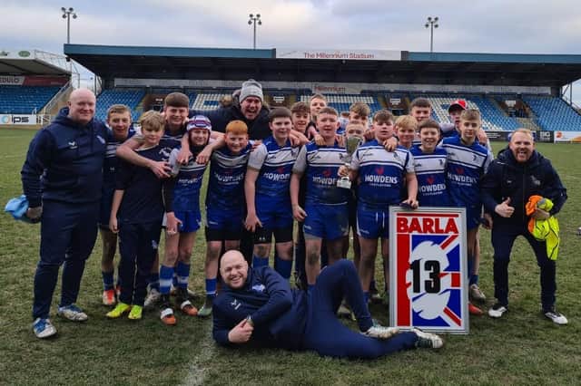 County champs Lock Lane U13s celebrate winning the BARLA Yorkshire Cup final at Featherstone Rovers’ ground.