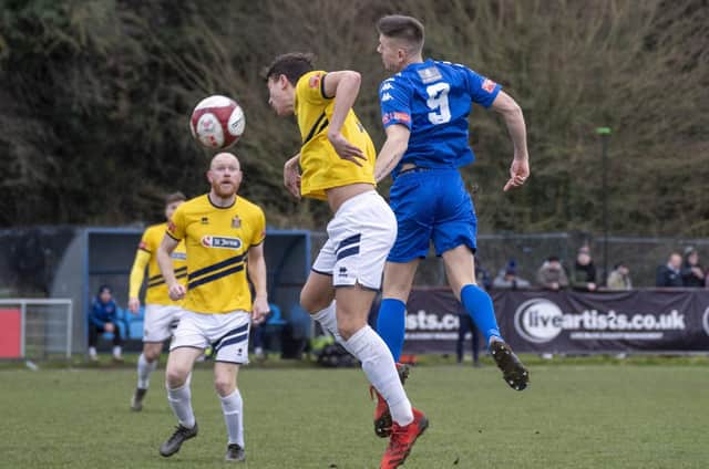 Joe Lumsden shows determination to try to win the ball for Pontefract Collieries in their game against title contenders Marske United. Picture: Scott Merrylees