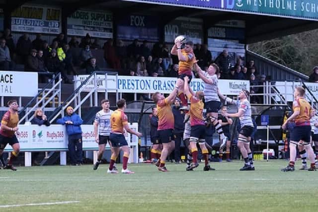 Line-out action sees Sandal secure possession against Preston Grasshoppers.