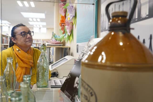 Jane Carter interacts with the new Faces of South Elmsall exhibition.