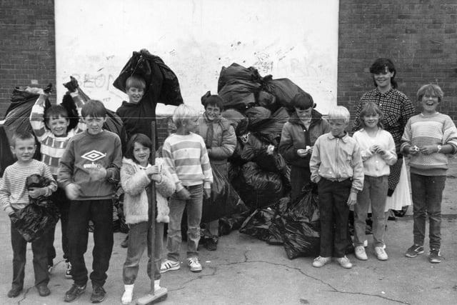Children of south Gipton taking part in a clean-up campaign on the estate in November 1987. It was a project instigated by the Gipton Community Refurbishment Scheme and the children were involved as part of a holiday play project.