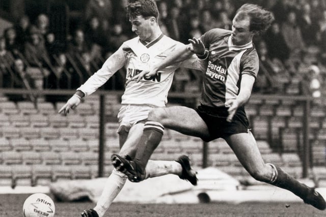 John Sheridan fires towards goal as Barnsley defender John McDonald attempts to make a challenge. Shez scored as the Whites drew 2-2 at Elland Road in February 1987.