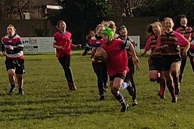 Olivia Stead races ahead of the pack in Castleford RUFC U13s’ game against Littleborough.