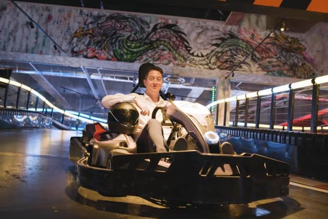 Harvey Jenkinson, Co-founder and CEO of Gravity Active Entertainment, in new e-kart.