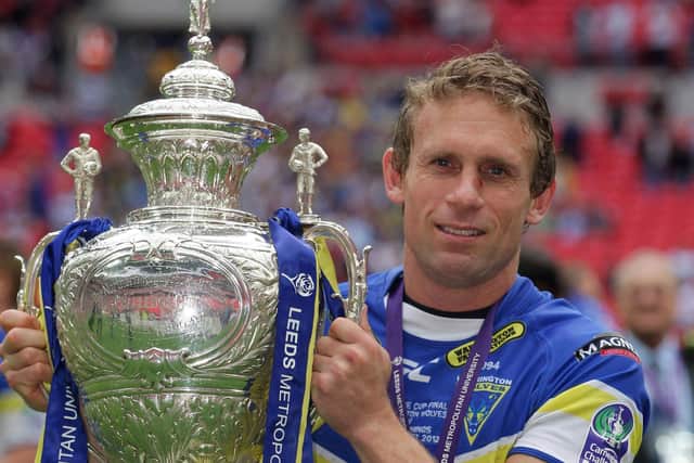 STANDOUT MOMENT: Man of the match Brett Hodgson holds the Challenge Cup after winning it with Warrington Wolves in 2012. Picture: Matthew Impey/PA Wire.