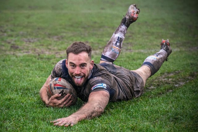 Connor Jones is all smiles as he scores a try for Featherstone Rovers against Workington Town. Picture: Dec Hayes