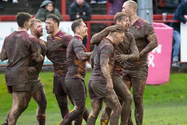 Batley Bulldogs celebrate Lucas Walshaw's try against York City Knights. Picture: Neville Wright